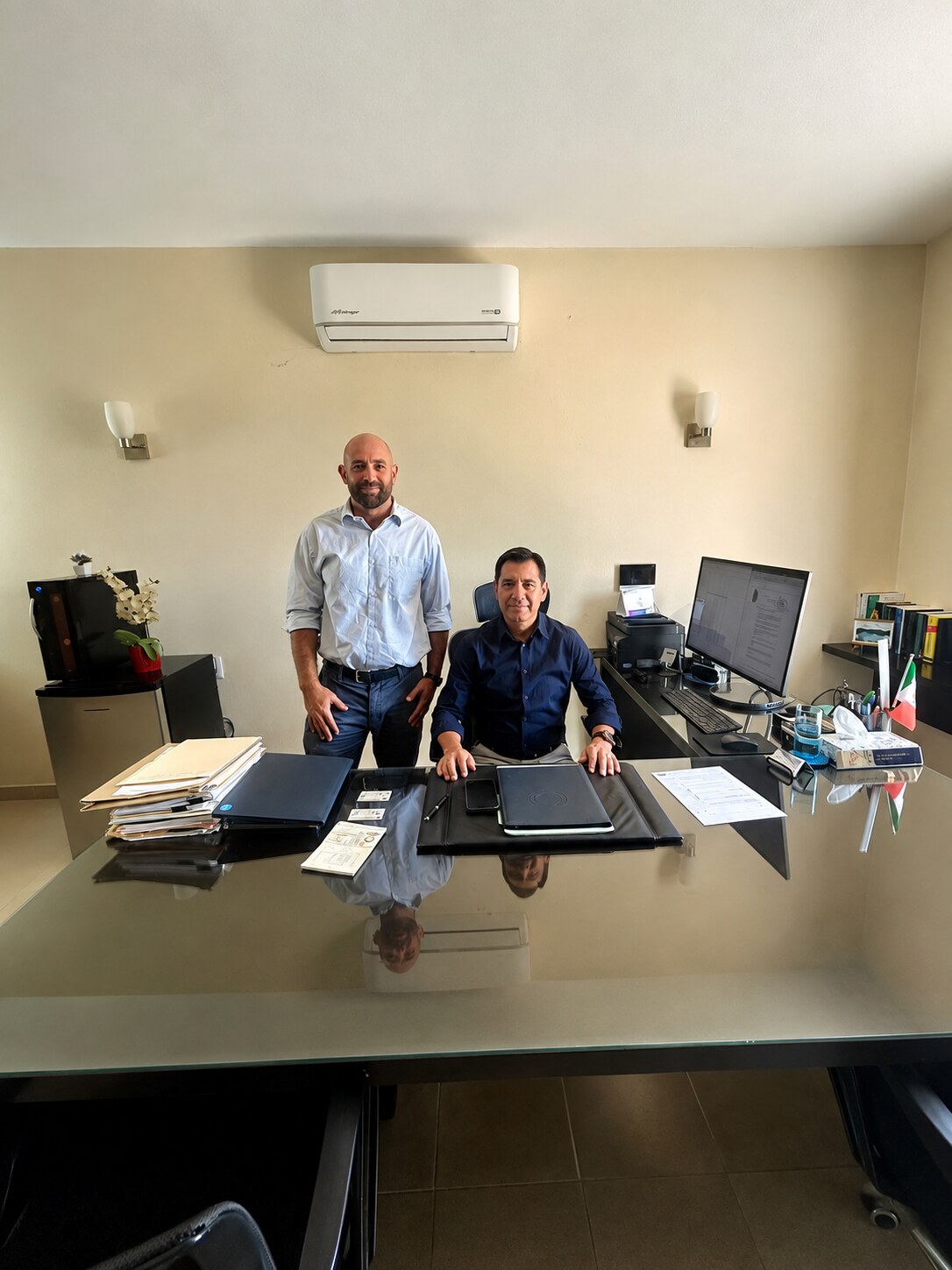 Real estate paperwork professionals reviewing documents